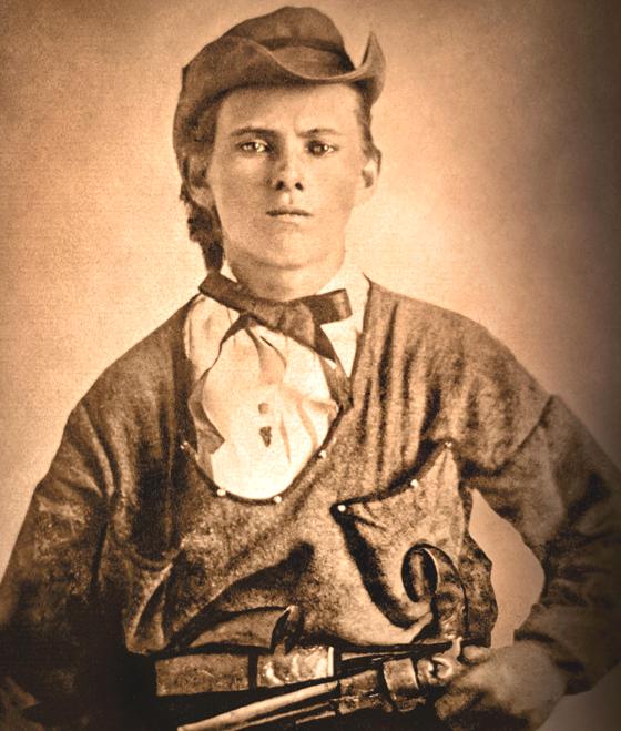 Famous outlaw Jesse James with a revolver drawn c1870